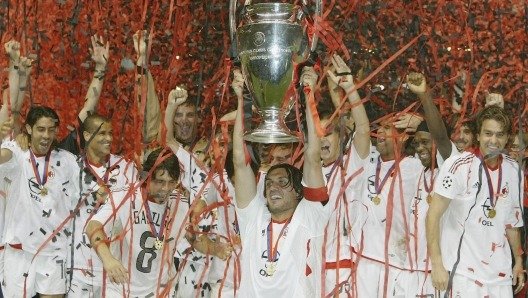 Milan captain Paolo Maldini lifts the 2003 Champions League trophy after the penalty shootout victory in the final against Juventus. Getty Images